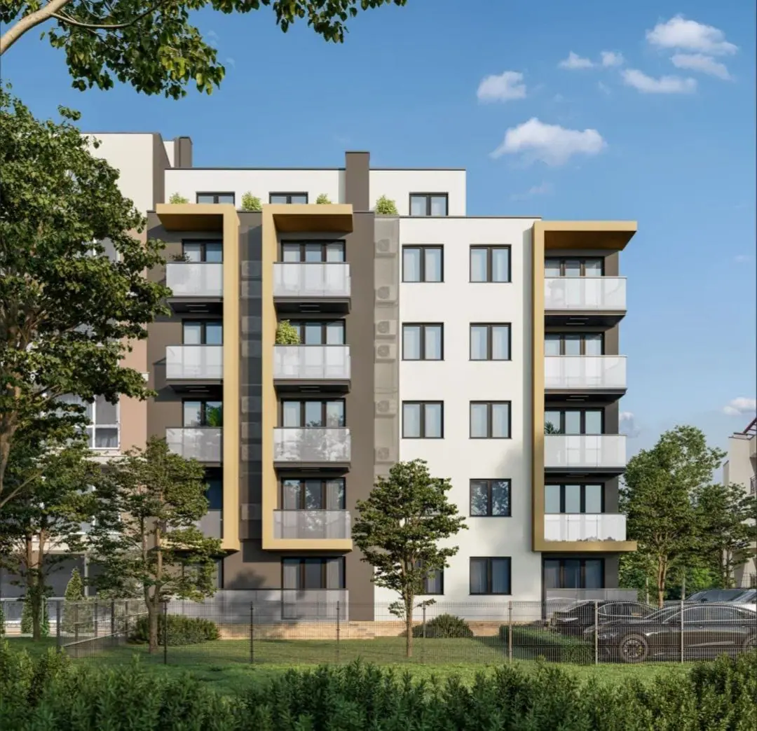 Современный трехкомнатный апартамент в комплексе City v2, с балконами, зелеными насаждениями и парковкой на территории.