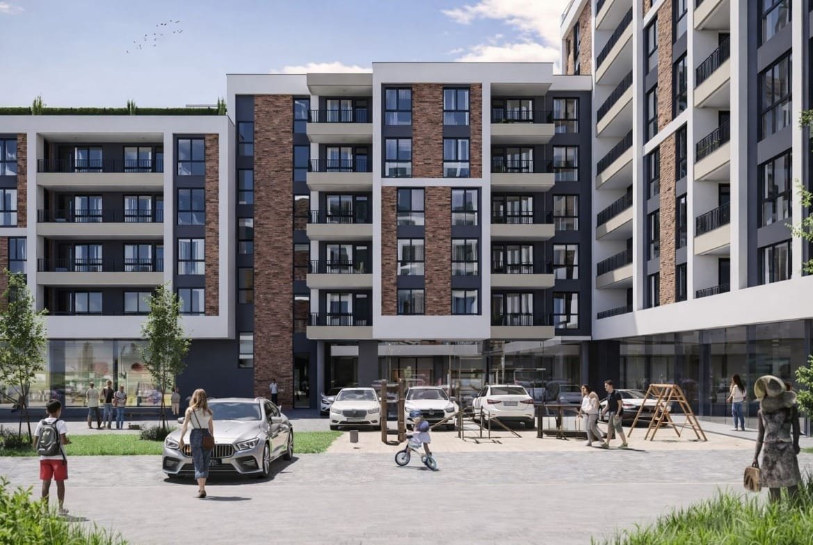 Современный жилой комплекс в Болгарии с прогулочной зоной, детскими площадками и парковкой для автомобилей.